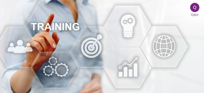 Professionals reviewing charts and processes during ISO training session for quality and compliance in Pakistan